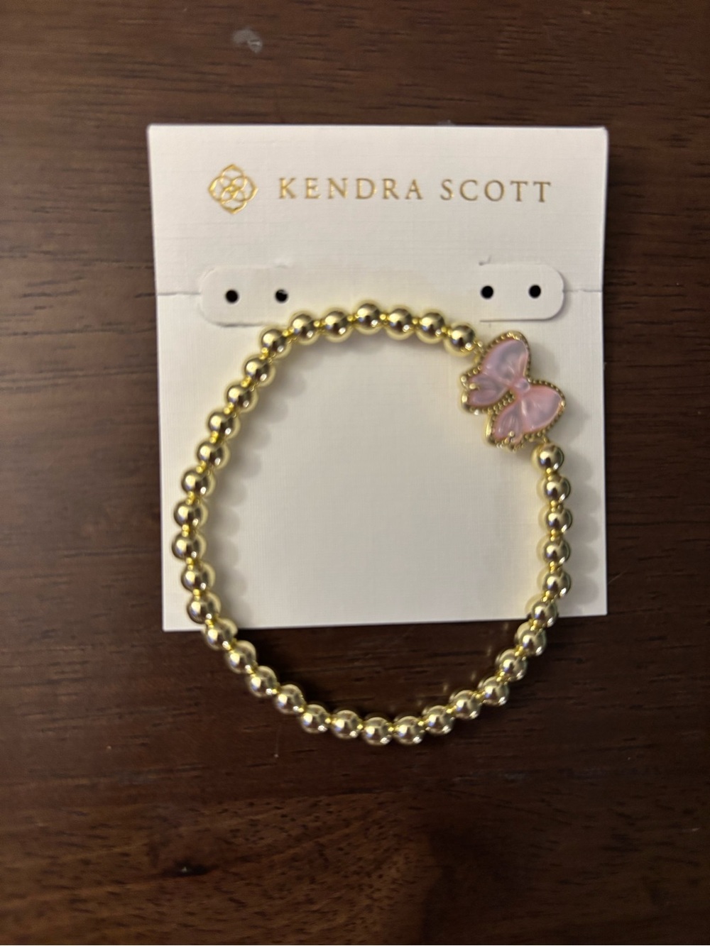 Kendra Scott Gold Beaded Bracelet with Pink Butterfly Charm, brand new